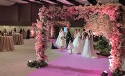 Bridal and wedding party fashions were presented as vignettes with live models during the Market’s fashion presentation.
