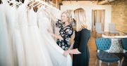 Sales Manager Sara & Stylist/Social Media & Marketing Coordinator Kylie training on new bridal collections.