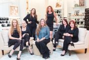 The Gilded Gown stylists (L to R): Grace Alexander (owner’s daughter), Vicki Senape, Elizabeth Ethridge (owner’s sister), Heather Lynn, Andrea Yeager, Emily Muse. (Center, in blue top): Owner Jacqui Wadsworth.