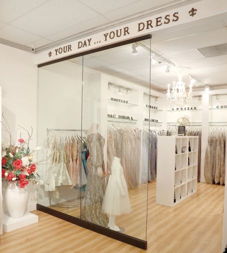 The Mothers/Prom/Evening Room is separated by glass from the bridal showroom.