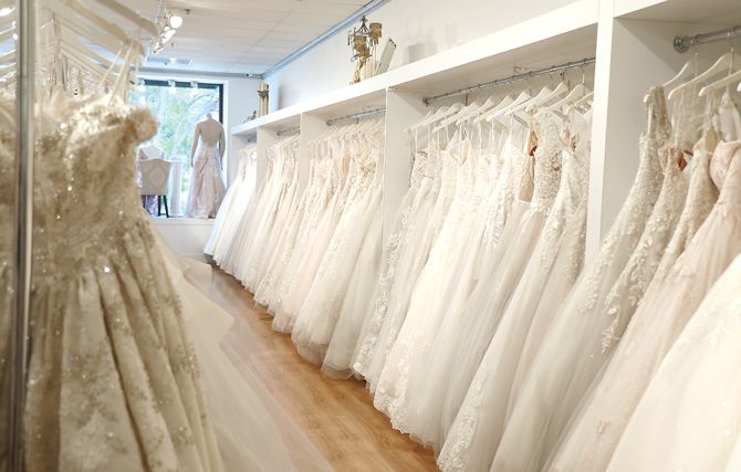 A view from the Mothers/Prom/Evening room looking toward the front of the street, showcasing specifically bridal ball gowns.