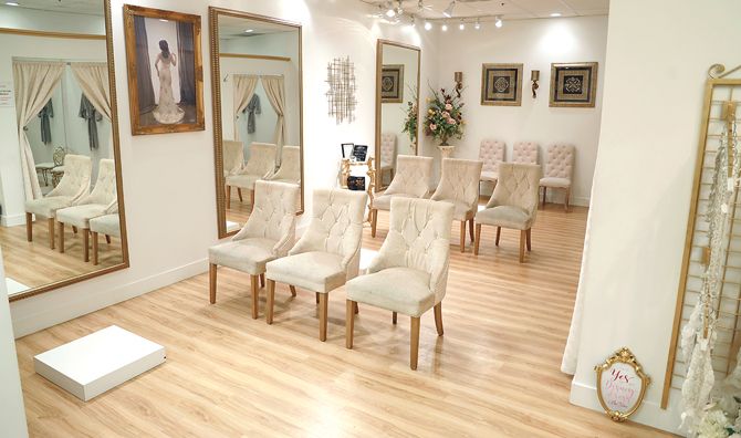 Bri'zan Couture's three bridal suites are accented with full length mirrors and upscale seating