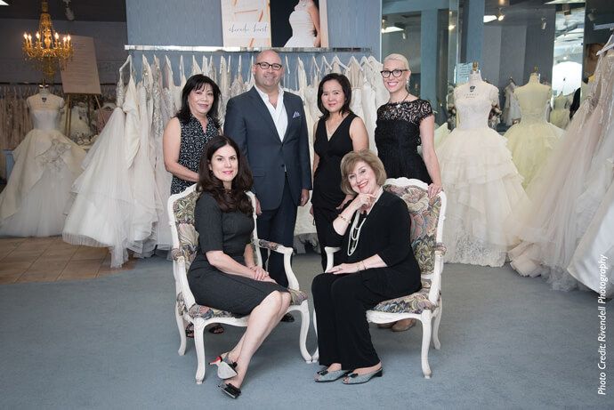 The J.J. Kelly team (L to R, top): Hoan Pham (seamstress), Patrick Kelly (owner), Que Nguyen (head seamstress). (L to R, bottom): Jane Kelly (owner) and Dorothy Kelly (owner).