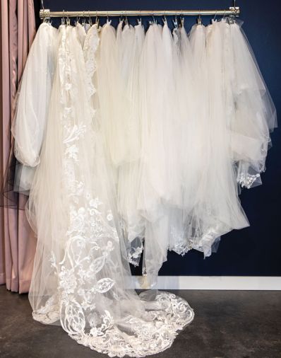 Veils hang on display at Janene’s Bridal’s Alameda location.