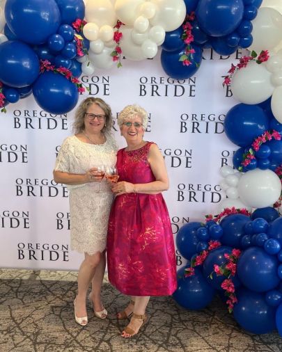 Anna Totonchy (right), owner of Anna's Bridal Boutique, announced the transfer of store ownership to long time manager Katie McNutt (left).