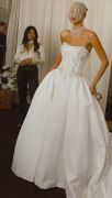 Spring 2027 gowns take center stage at event.