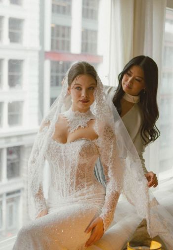 Crystal Lu puts a few finishing touches prior to gown showcased.