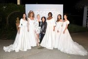 Allure Bridals Global Brand Director Nikki Deeds (3rd from L) and Emmy award-winning costume designer Lyn Paolo (4th from R) attend the Allure Bridals Bridgerton Wedding Collection launch event. (Photos by Vivien Killilea/Getty Images for Allure Bridals)
