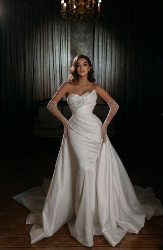 Dovita Bridal, at the forefront of European bridal fashion, presents its Galaxy 2023 collection named after celestial bodies. Shown: Moon mermaid with detachable skirt.