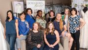 The Downtown Bridal staff (L to R along the back): Alicia McCarley, seamstress; Dayna Nosal, head seamstress; Maria E Demetriou, operations manager/master seamstress; Tierra Hudson, store manager; Mary Monzel, sales manager; Marlies Derby, seamstress/consultant; Hannah Ennis, asst. manager; Colleen Hazel, owner; (Seated): Bethany Peterson, consultant; Rita Donson, asst. manager. Several consultants not pictured.