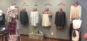 The third-floor trend boutique at Finery Bridal & Trend features exposed brick walls, refinished hardwood floors and old barn wood for the trim.