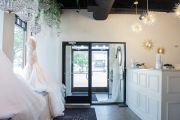 The open and airy entrance is perfect for displaying wedding dresses.