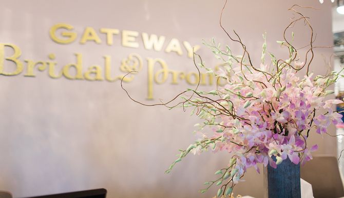 Having a statement floral piece in the reception area is a must for Gateway Bridal and Prom in Salt Lake City. Fresh-cut flowers are eye-catching and fill the salon with a subtle floral fragrance. Photo credit: Abby Khyl