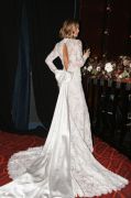 Gowns presented in themed vignettes.