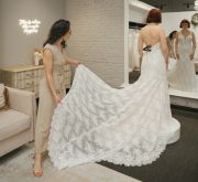 Jillian plays with a Morilee gown on bridal consultant Marisa in the Elevated Suite.