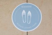 Floor circles remind Kleinfeld customers to 
socially distance while in the store.