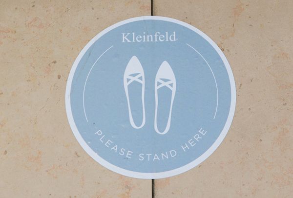 Floor circles remind Kleinfeld customers to 
socially distance while in the store.