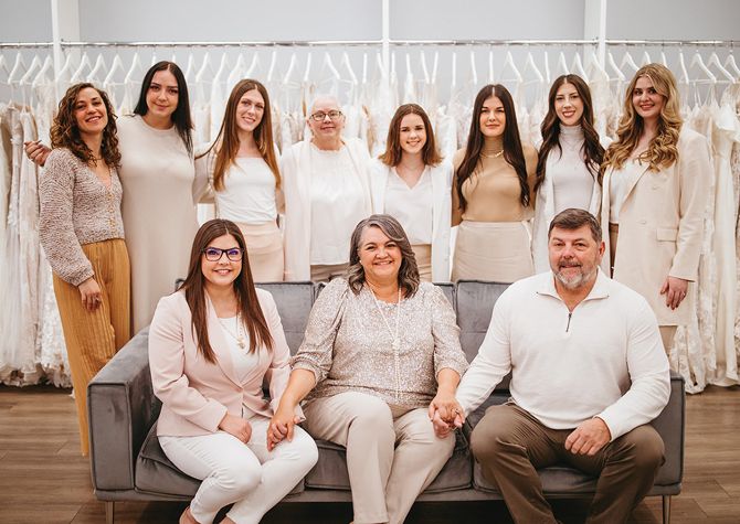 The Marcella's Bridal team (from back L): Becky Allhands (Seamstress), Juliann Nelson (Assistant), Amanda Gallaher (Bridal Stylist), Lori Wilson (Seamstress), Lauren Achenbach (Bridal Stylist), Mikaila Schmidt (Social-Media Specialist), Kait Madison (Bridal Stylist) & Morgan Draca (Bridal Stylist). Front Row: Owners - Kassi Neubauer, Marcella Davis & Craig Davis.