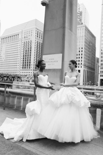 Models showcasing Lazaro gowns