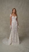 Odette: Strapless fit-and-flare gown featuring a soft sweetheart neckline, structured bodice, and all over dimensional embroiderd lace with scallop detailing.