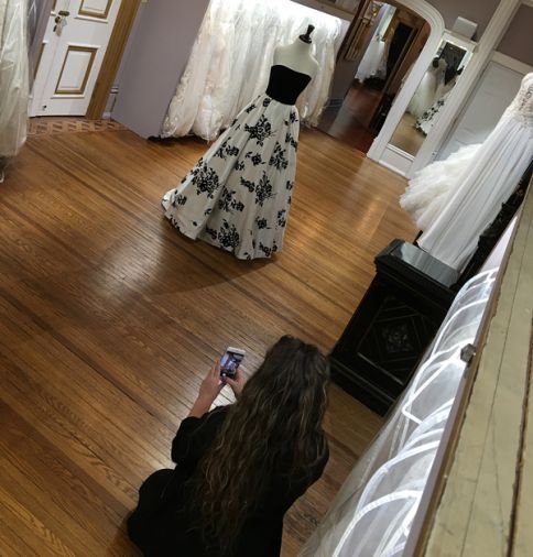 Timeliness is of the essence! Renaissance Bridals & Prom marketing manager Katie Harper captures the elements of this Sherri Hill ball gown as well as the grandeur of the store. “We really try to capture the essence of our store through our photos,” owner Jon Smith says. “Customers love learning about our building, which was built in the 1850s and has many original elements.”