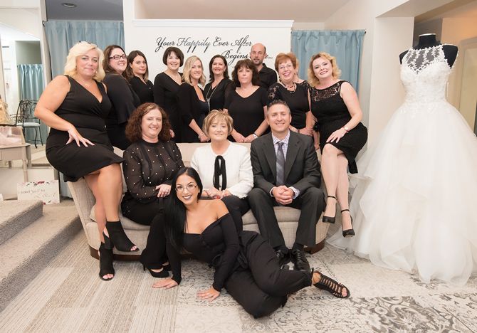 L & H Bridal Staff seated on couch: Owner Lucia Ciotti (center) with children Danielle (general manager) and Anthony (business manager). Jeffrey Vincent Photography