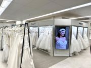 The new store features in-store designer boutiques, as in this Morilee presentation.