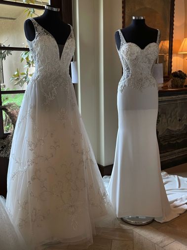 Carly style 2451 (left) and Cilia style 2452 from Casablanca Bridal collection features the flattering feature of side cut outs