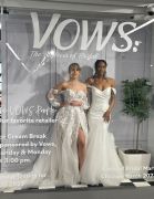 Kitty Chen Couture models posing in the VOWS Magazine booth graphic.