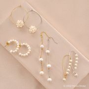 Novia s wedding jewelry collection includes pearl earring sets available in silver and gold.