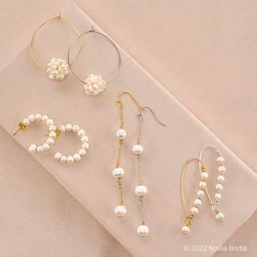 Novia's wedding jewelry collection includes pearl earring sets available in silver and gold.