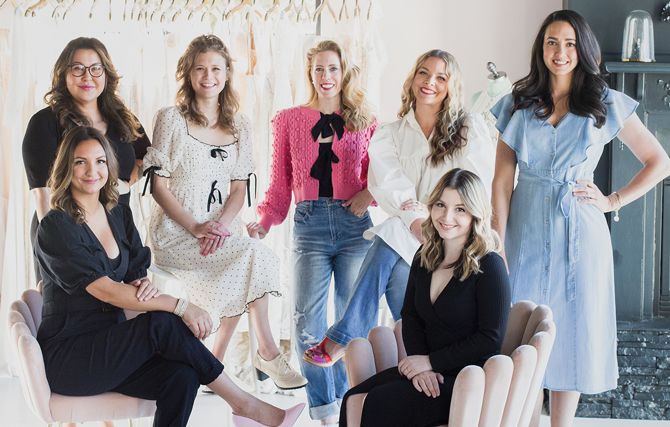 The Swoon Bridal team. Owner and founder Michelle Depoali is standing in the center of the back row.